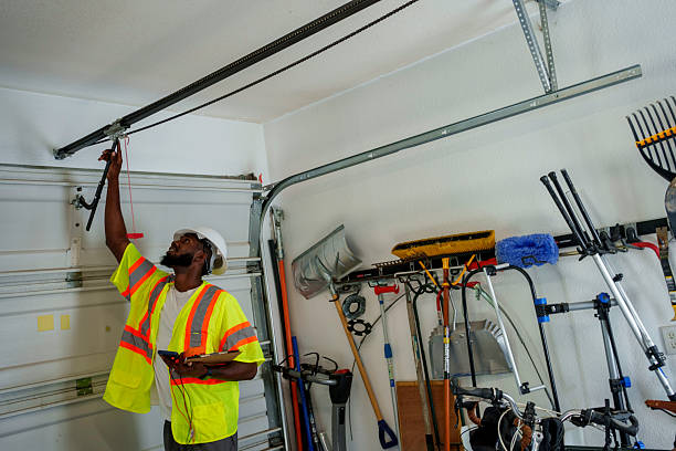 Professional Garage Door Panel Replacement technician working in Dodge Center, MN